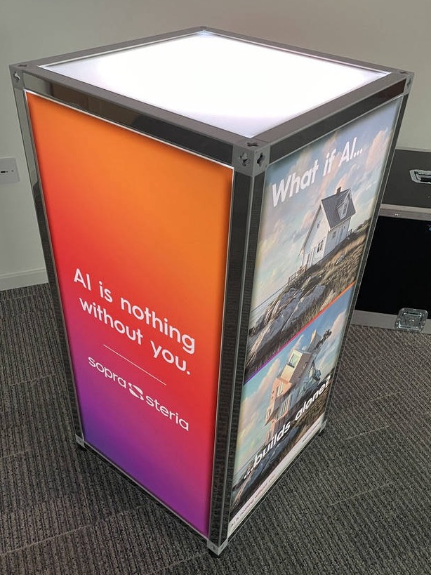 Illuminated podium for suggestion boxes and feedback boxes