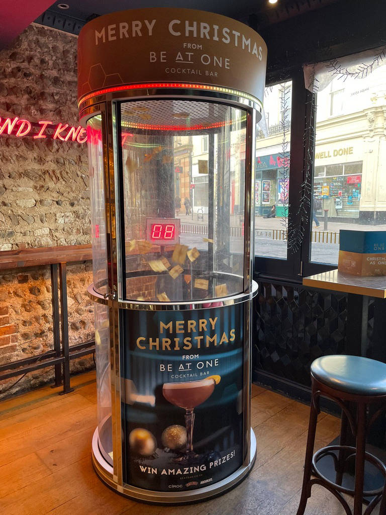 Cocktail bar ball grabber game